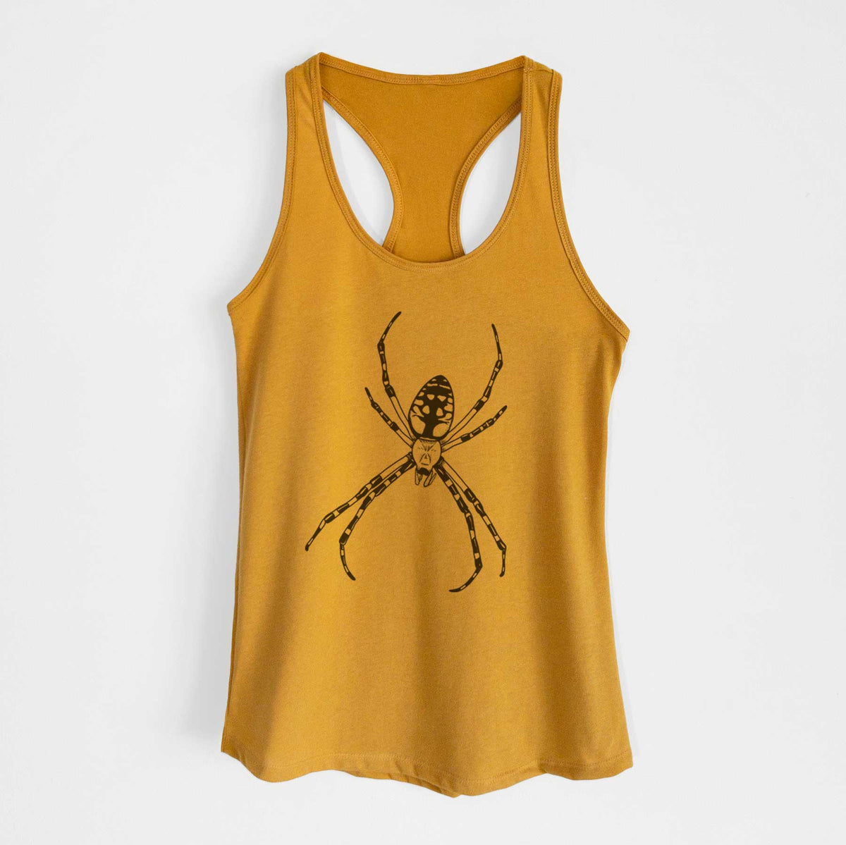 Gold women's racerback tank top laid flat, printed with a detailed black ink illustration of a garden spider with long striped legs.