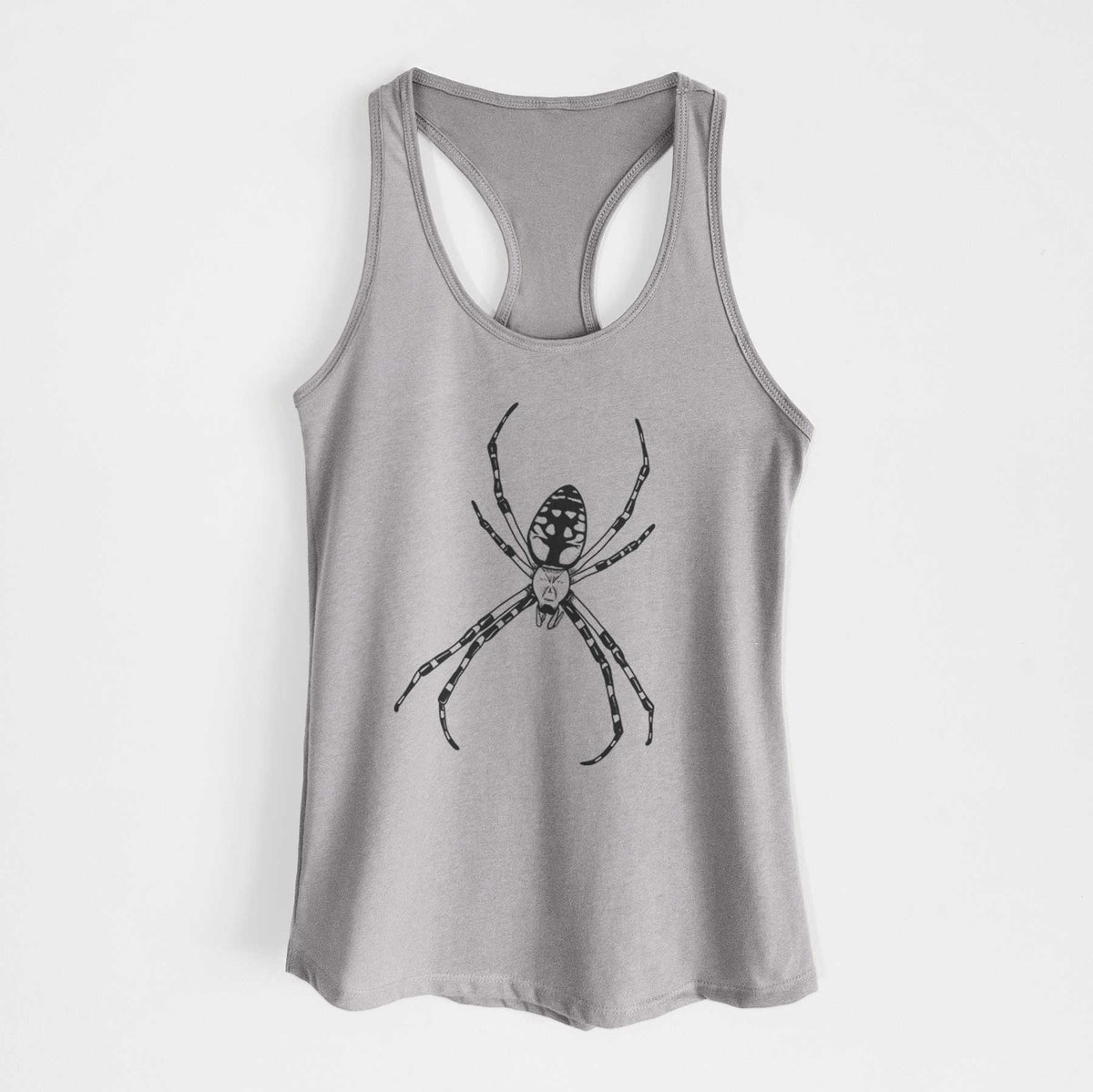 Heather grey women's racerback tank top laid flat, printed with a detailed black ink illustration of a garden spider with long striped legs.