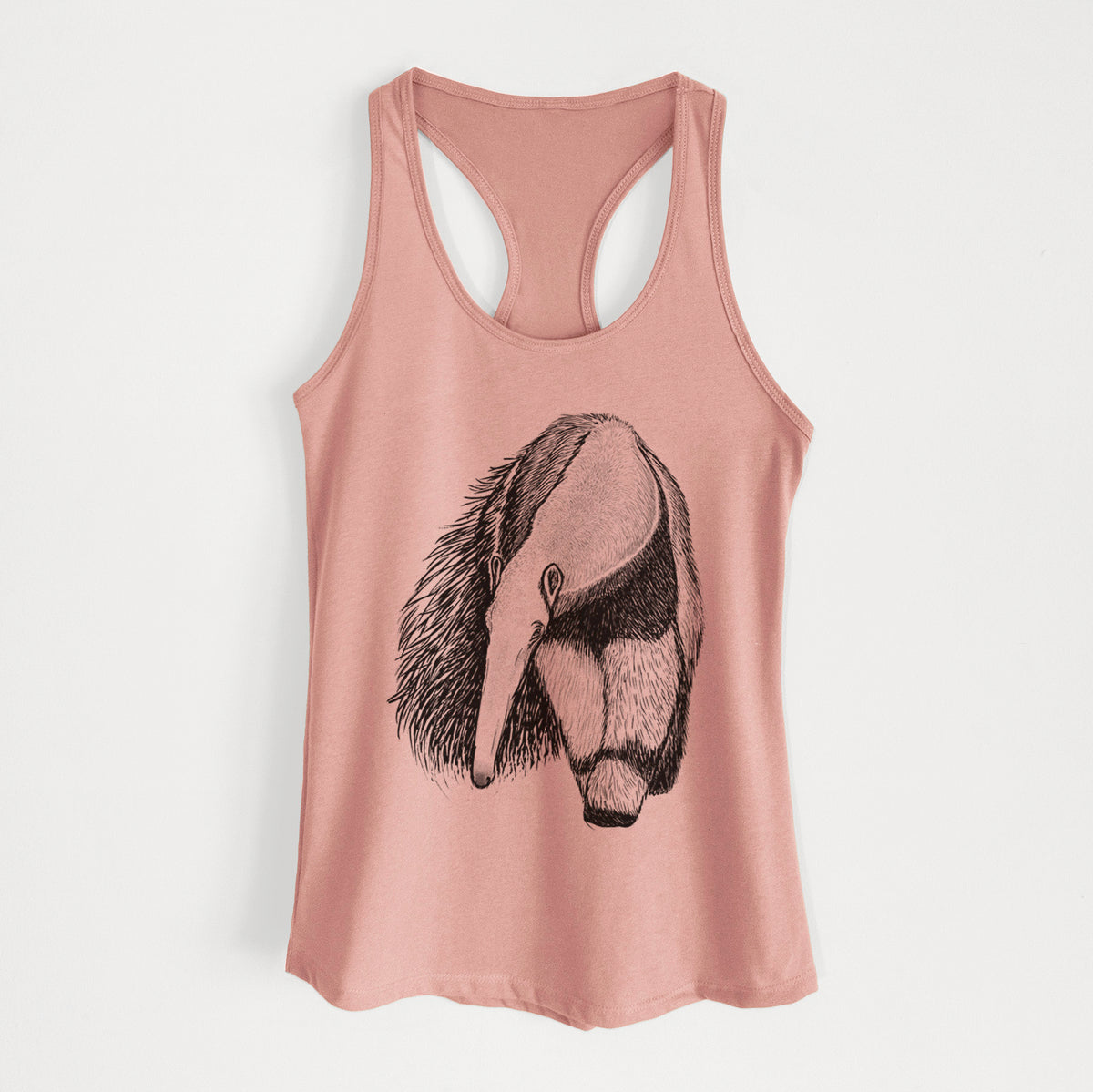 Desert pink women's racerback tank top laid flat, printed with a detailed black ink illustration of a giant anteater with its long snout and bushy tail.
