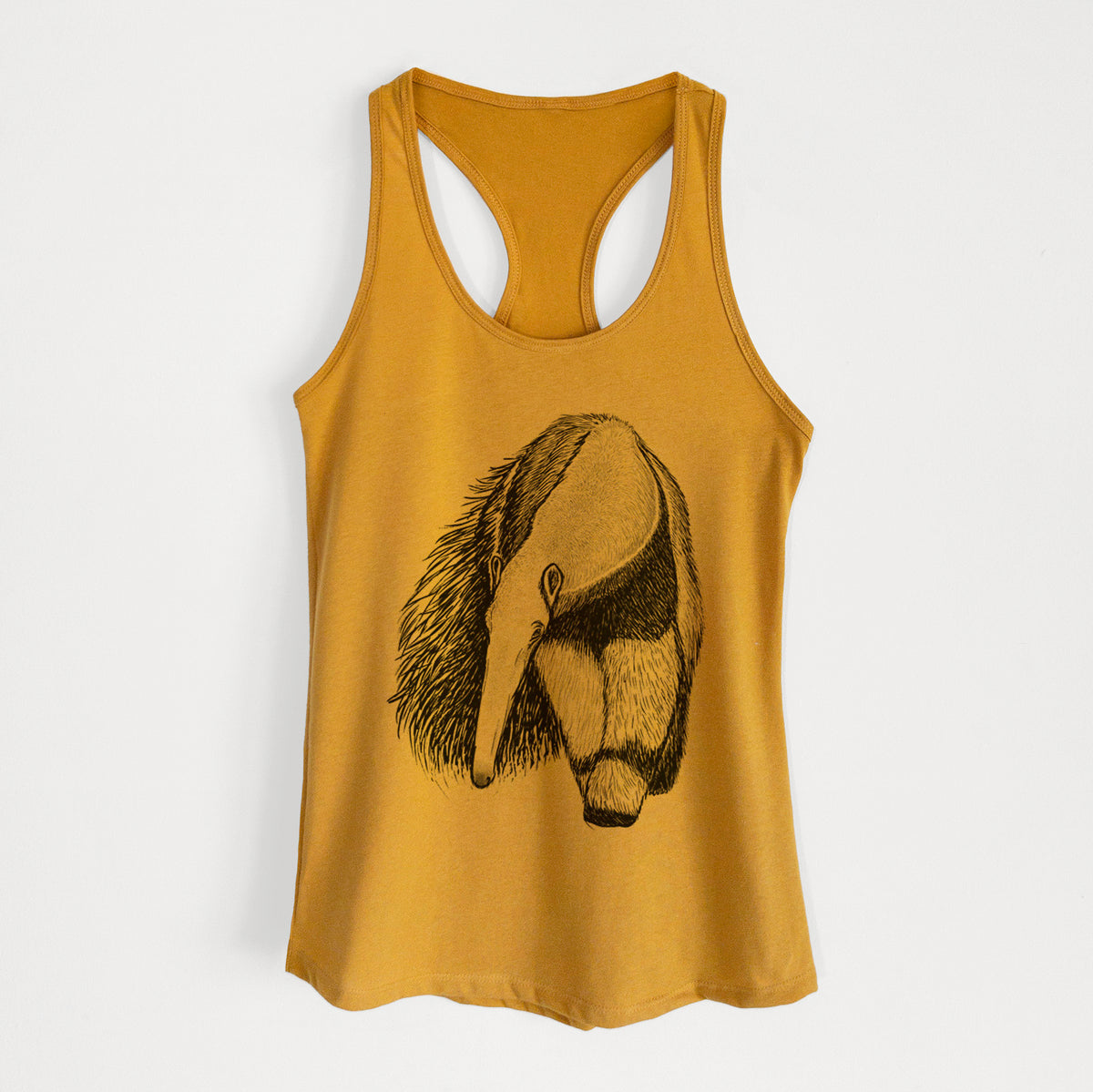 Gold women's racerback tank top laid flat, printed with a detailed black ink illustration of a giant anteater with its long snout and bushy tail.