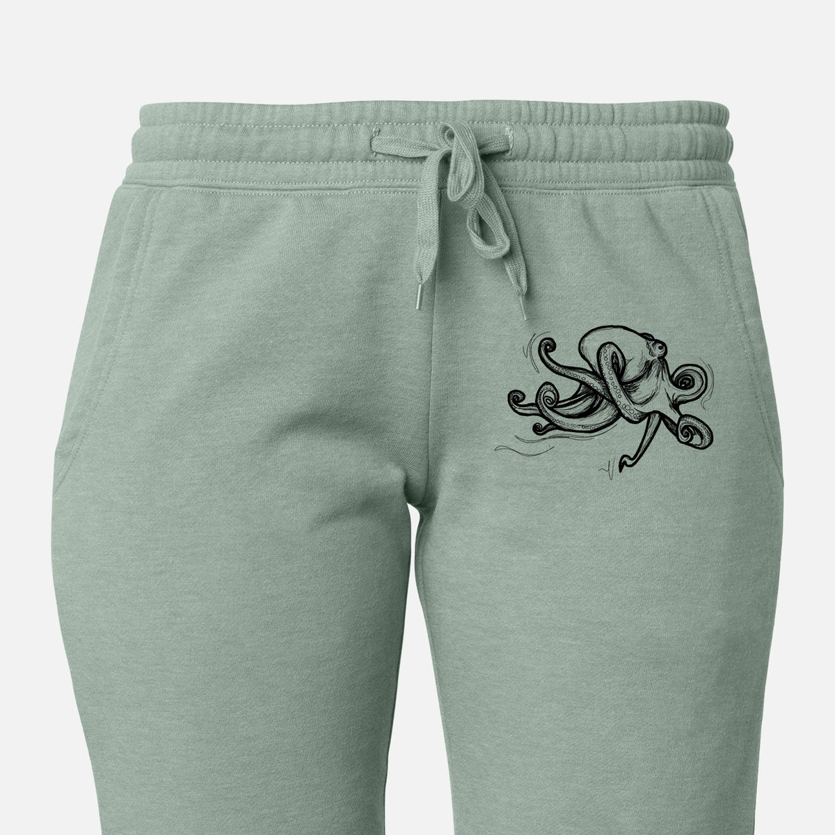 Front of sage green Cali Wave sweatpants, printed with a black ink illustration of a giant Pacific octopus with curling tentacles on the leg.