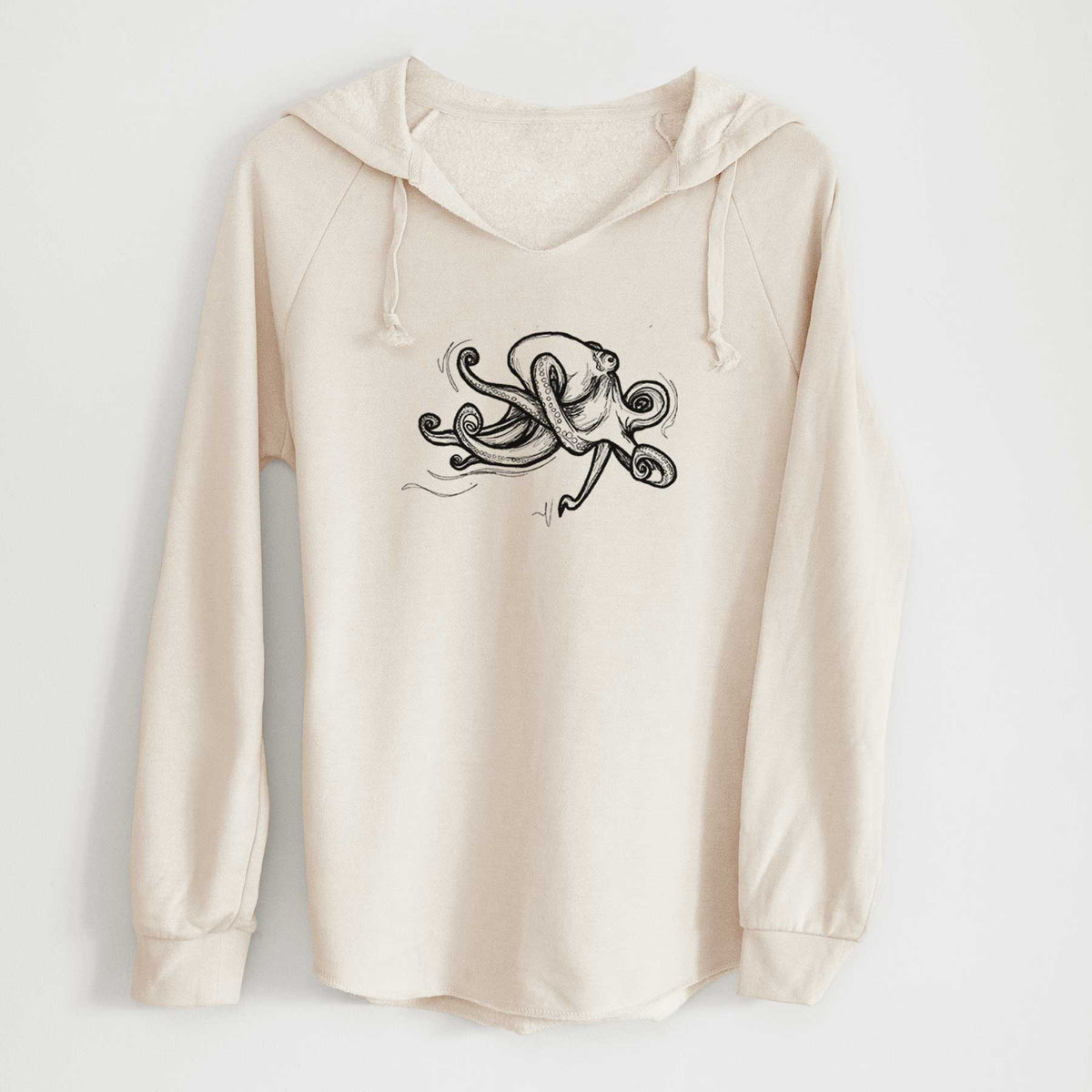 Bone cream women's Cali Wave hooded sweatshirt laid flat, printed with a black ink illustration of a giant Pacific octopus with curling tentacles.