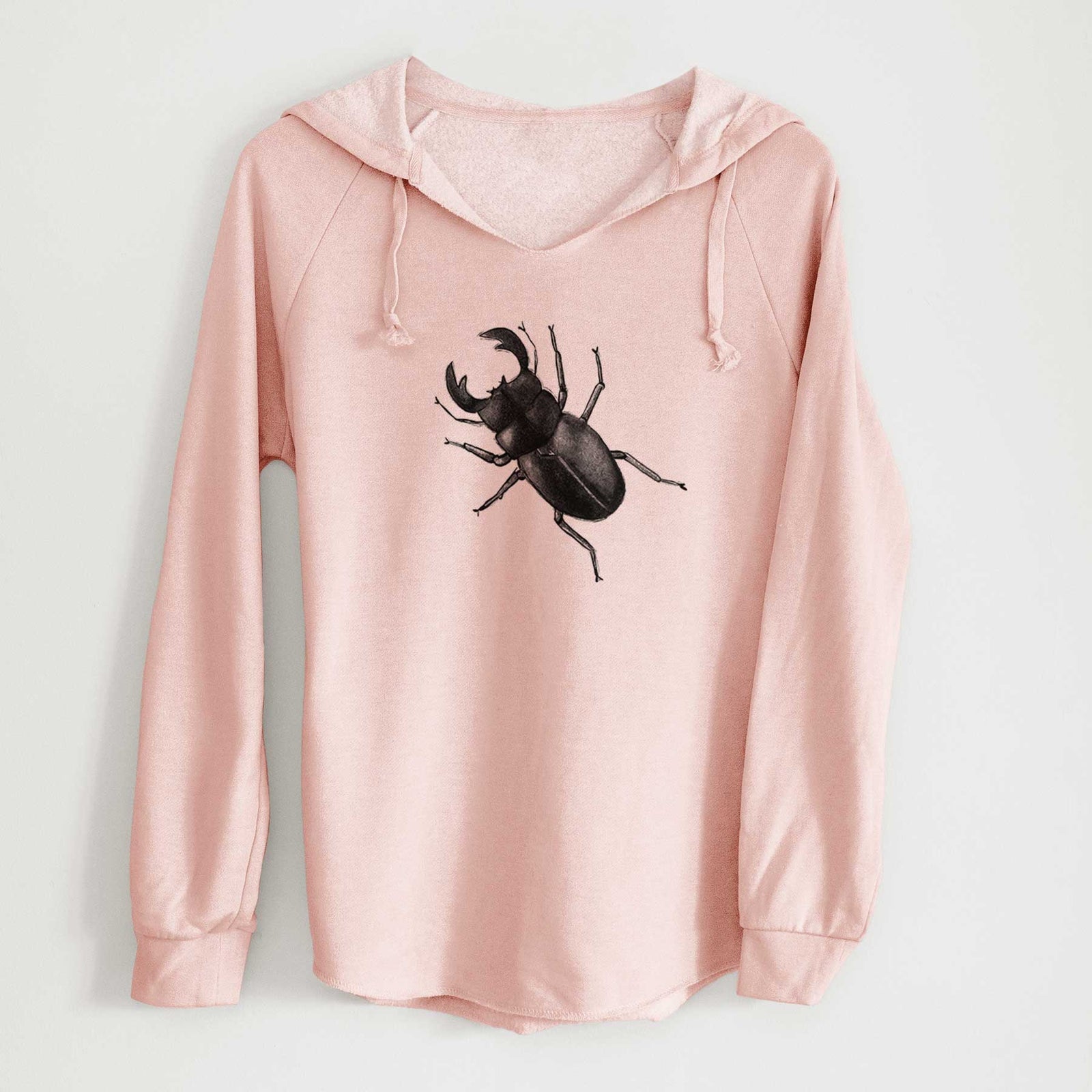Sage green women's Cali Wave hooded sweatshirt laid flat, printed with a detailed black ink illustration of a giant stag beetle with large jaws, seen from above.