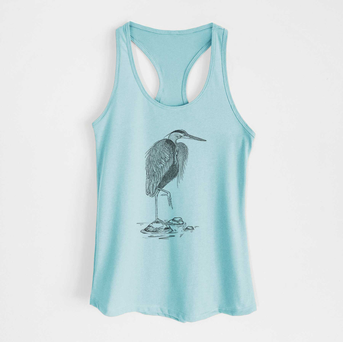 Cancun blue women's racerback tank top laid flat, printed with a detailed black ink illustration of a great blue heron standing on rocks.