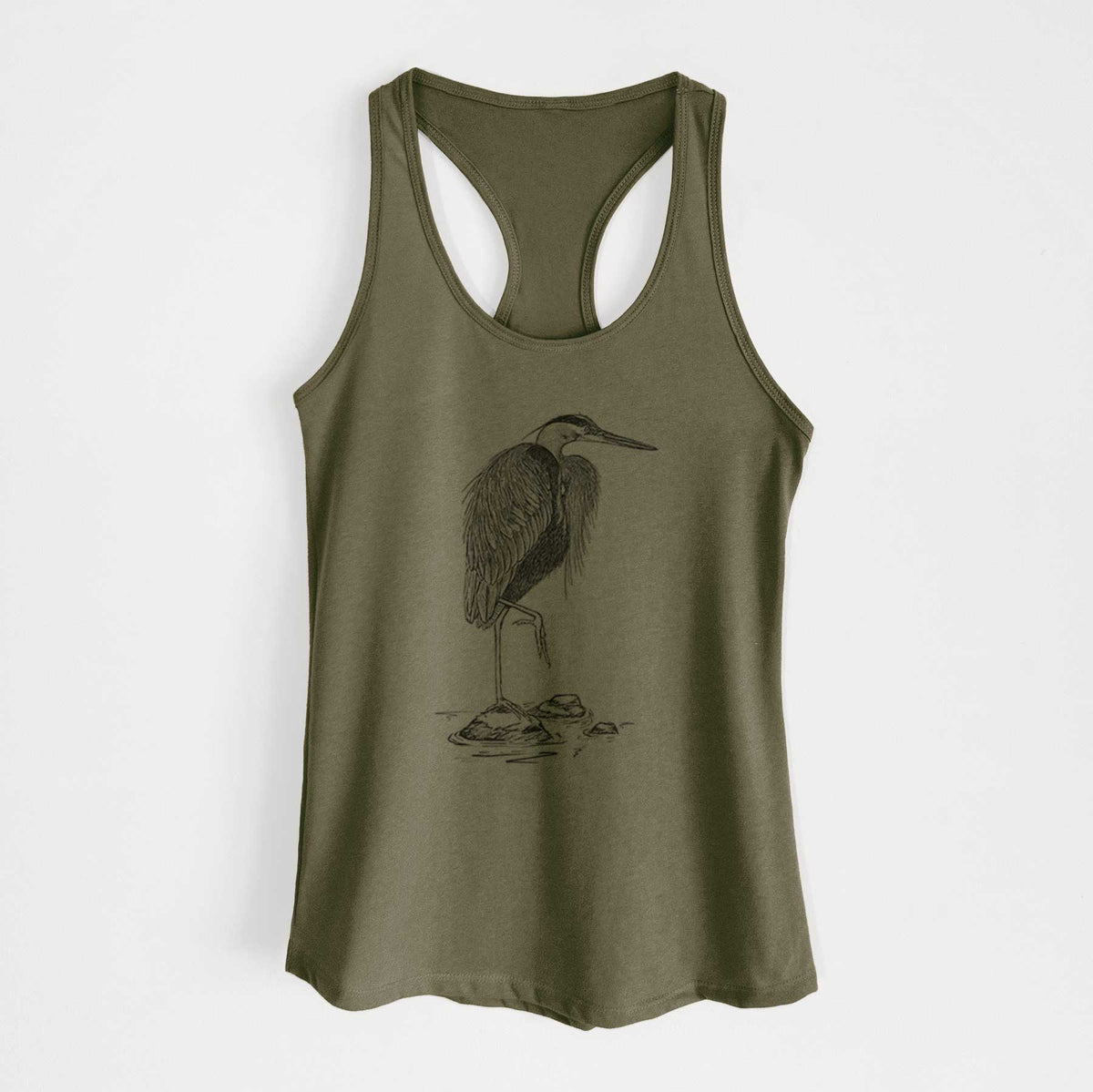 Military green women's racerback tank top laid flat, printed with a detailed black ink illustration of a great blue heron standing on rocks.
