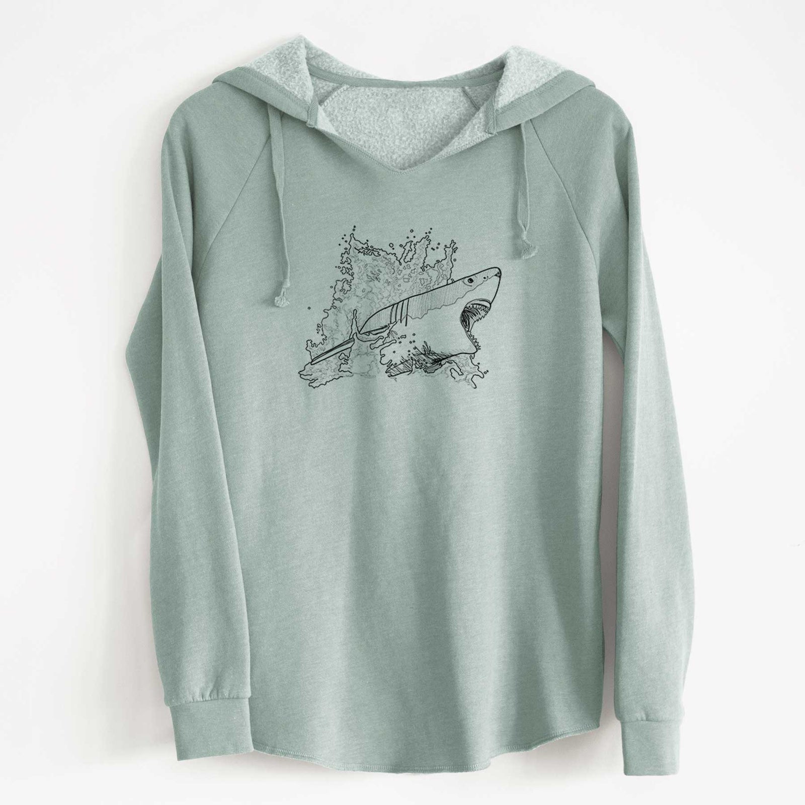 Misty blue women's Cali Wave hooded sweatshirt laid flat, printed with a black ink illustration of a great white shark breaking through a splash of water.