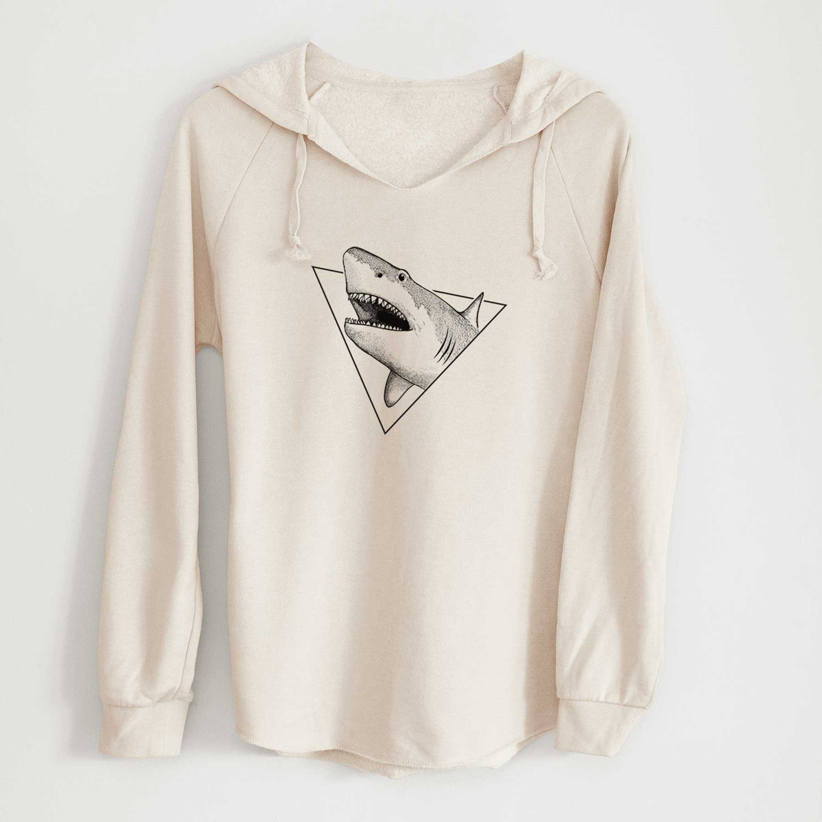 Bone cream women's Cali Wave hooded sweatshirt laid flat, printed with a black ink great white shark bursting out of a triangle outline with its mouth open.