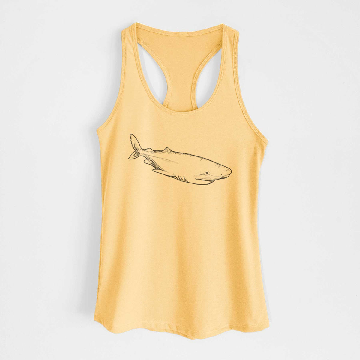 Banana cream women's racerback tank top laid flat, printed with a black ink illustration of a Greenland shark swimming.