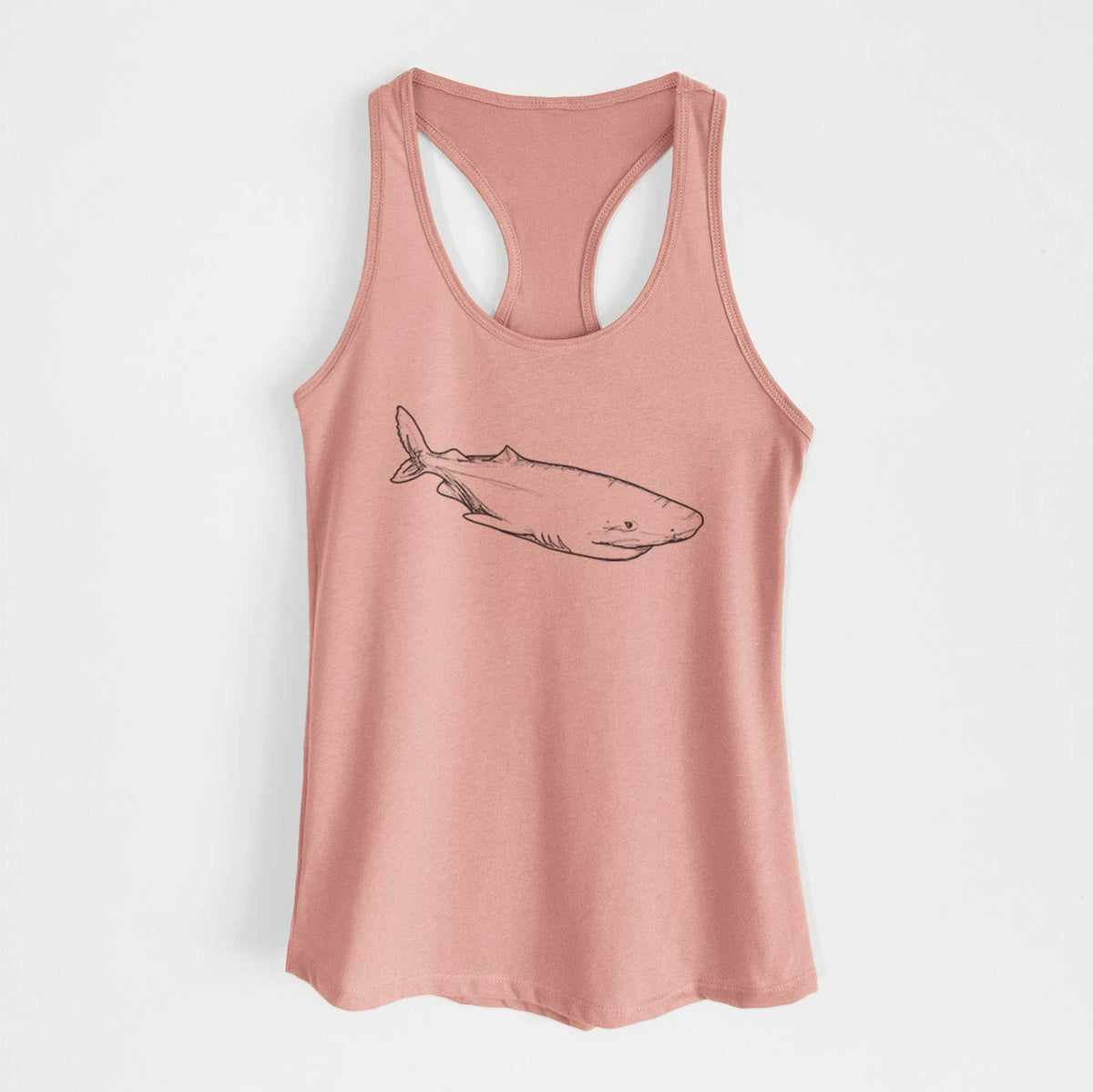 Desert pink women's racerback tank top laid flat, printed with a black ink illustration of a Greenland shark swimming.