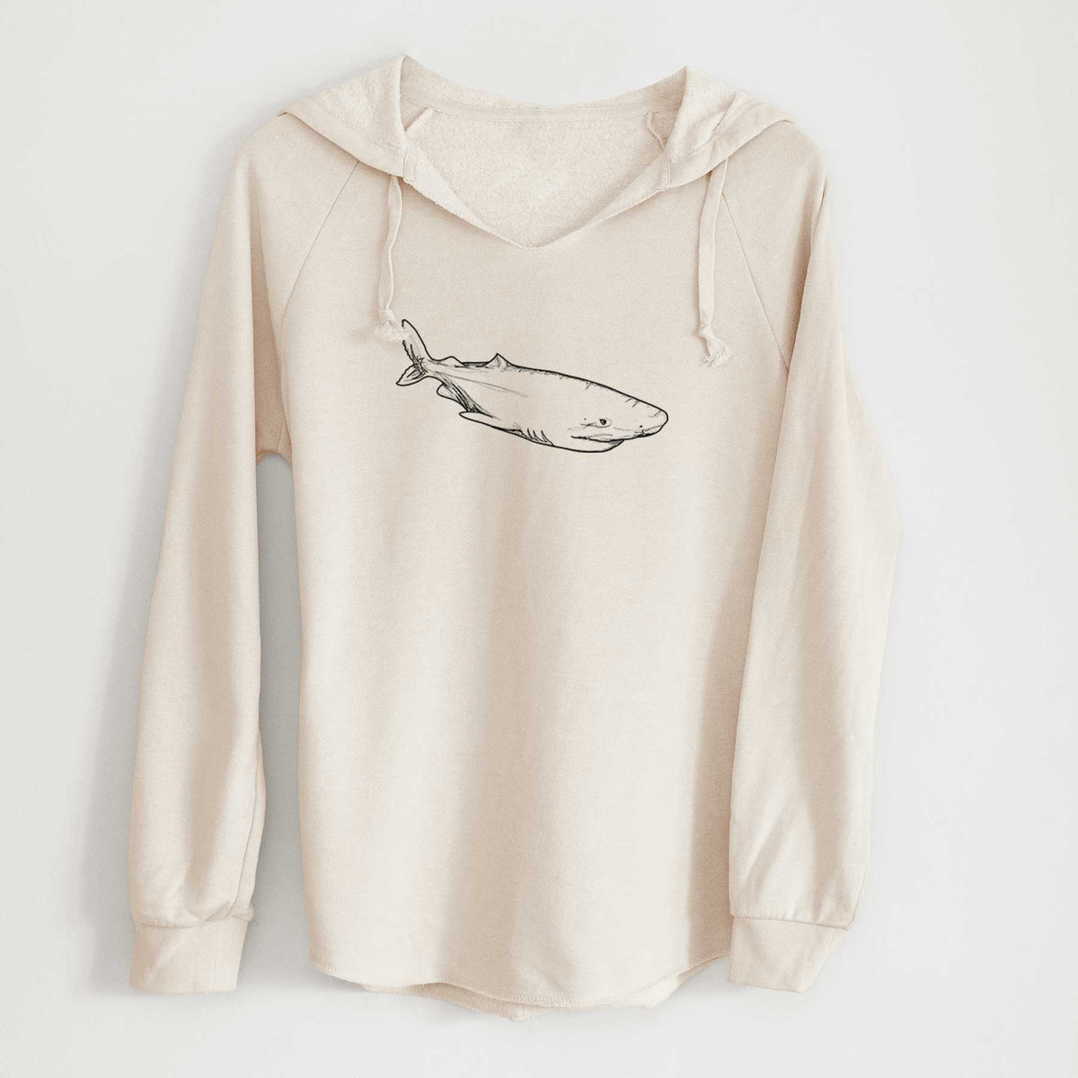 Bone cream women's Cali Wave hooded sweatshirt laid flat, printed with a black ink illustration of a Greenland shark swimming.