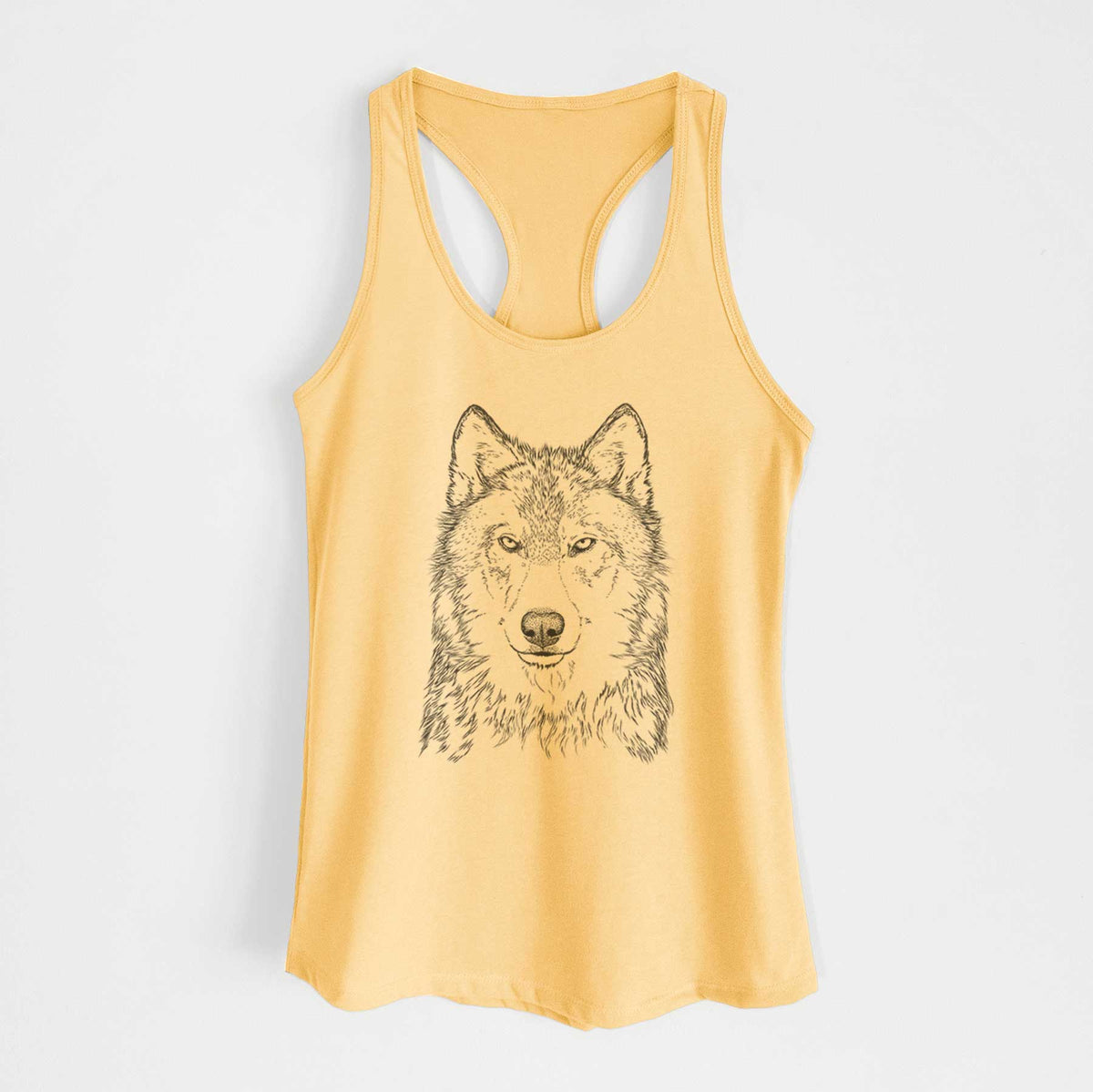 Banana cream women's racerback tank top laid flat, printed with a detailed black ink portrait of a grey wolf facing forward.