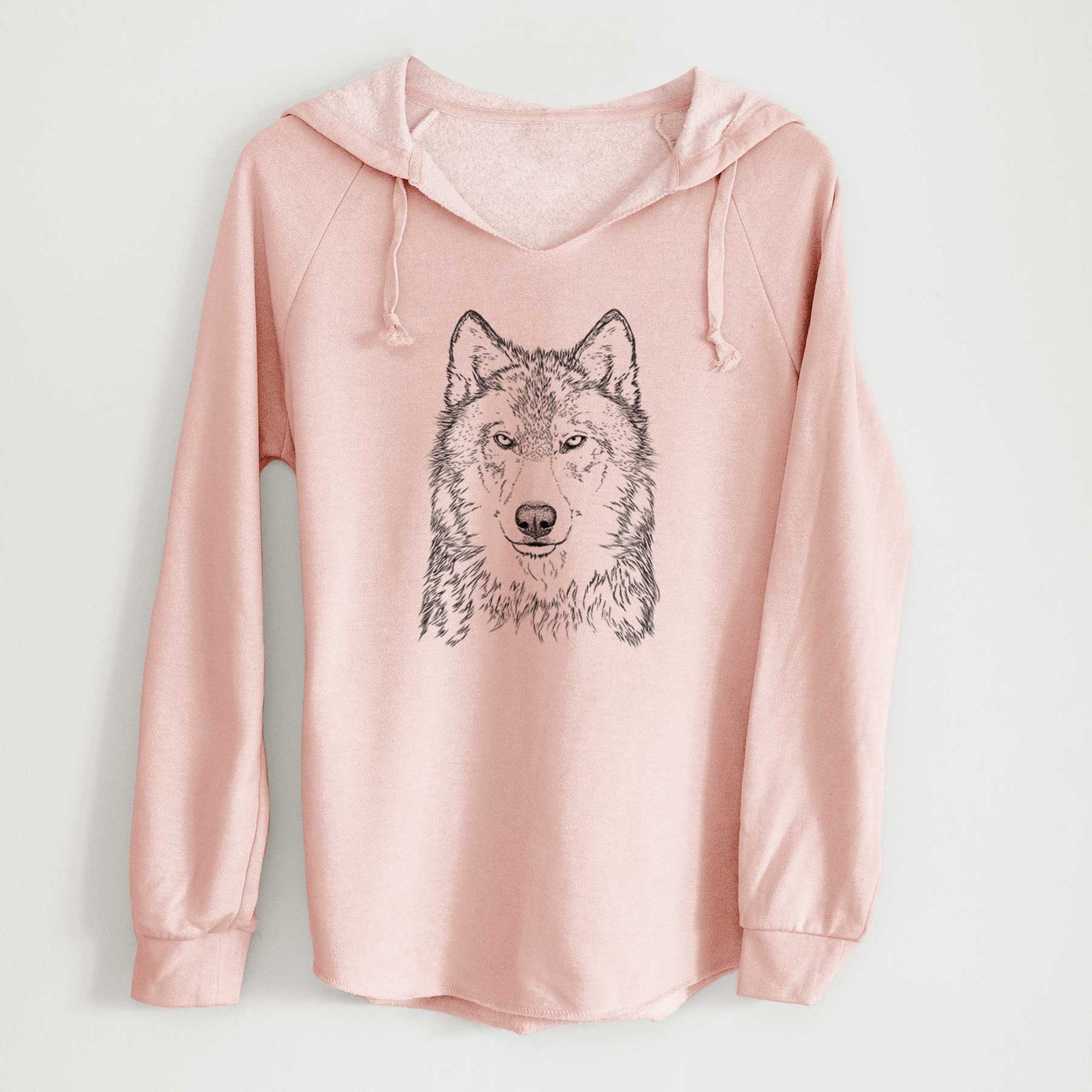 Sage green women's Cali Wave hooded sweatshirt laid flat, printed with a detailed black ink portrait of a grey wolf facing forward.