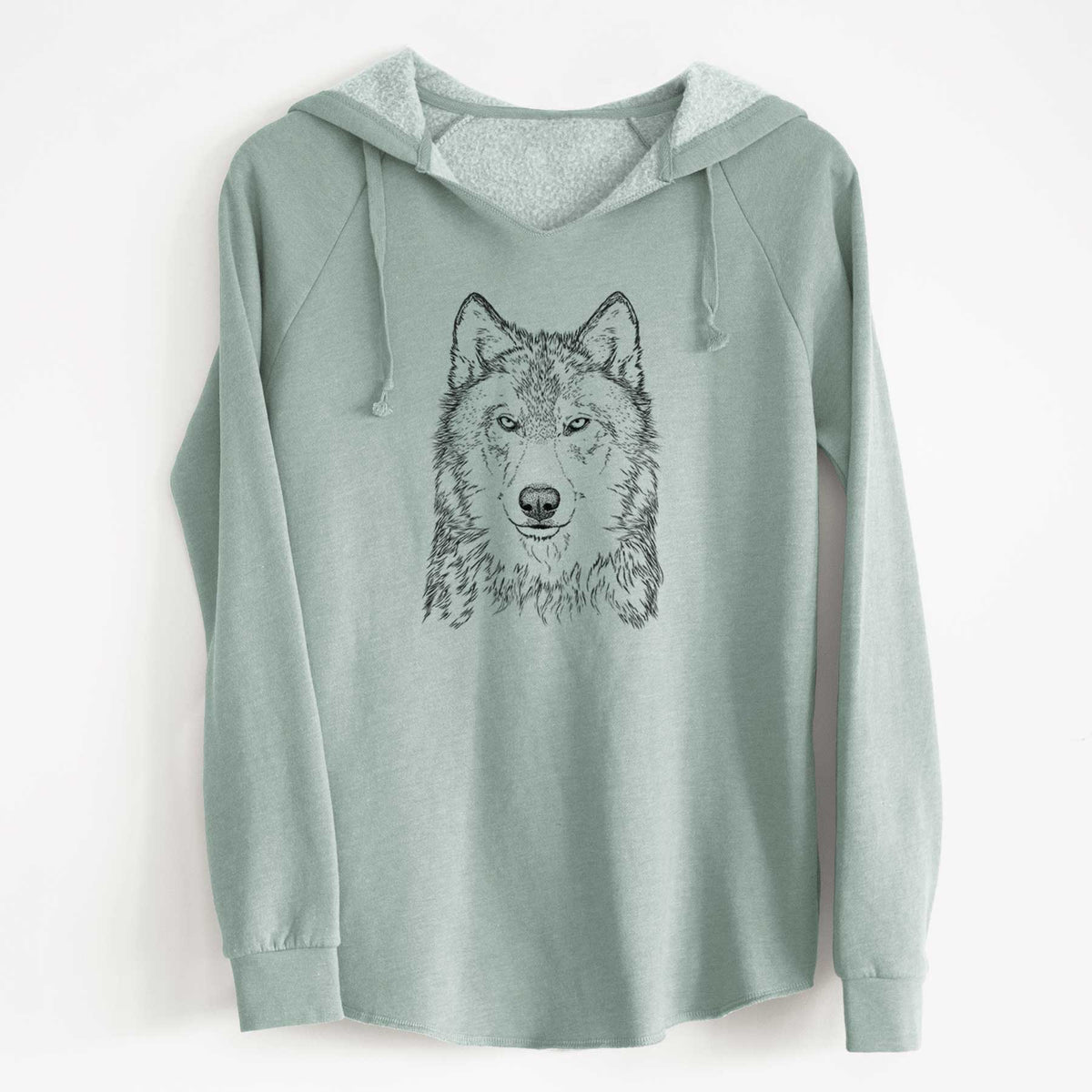 Sage green women's Cali Wave hooded sweatshirt laid flat, printed with a detailed black ink portrait of a grey wolf facing forward.