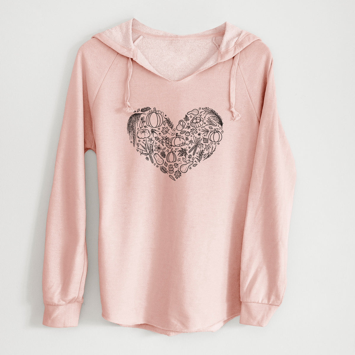 Blush pink women's Cali Wave hooded sweatshirt laid flat, printed with a heart shape filled with black ink autumn leaves, acorns, pumpkins and mushrooms.