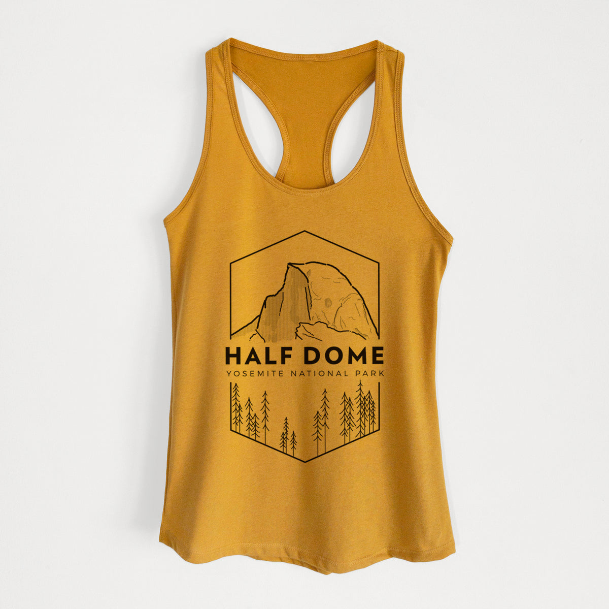 Gold women's racerback tank top laid flat, printed with a black line art badge of Half Dome above a pine forest, with the words Half Dome, Yosemite National Park.