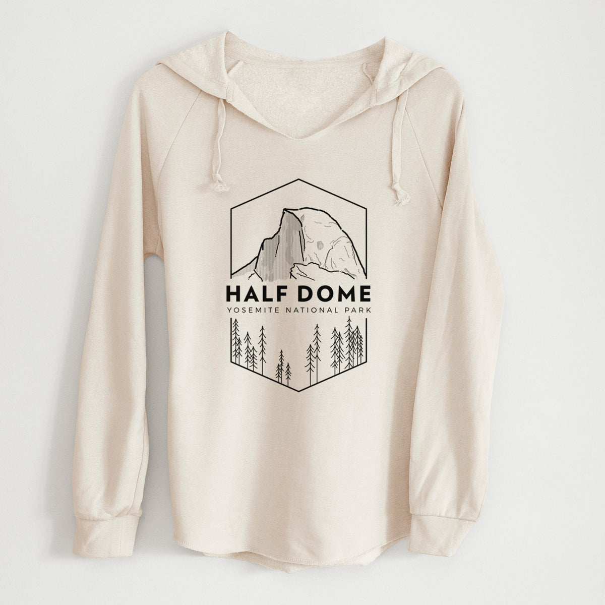 Bone cream women's Cali Wave hooded sweatshirt laid flat, printed with a black line art badge of Half Dome above a pine forest, with the words Half Dome, Yosemite National Park.