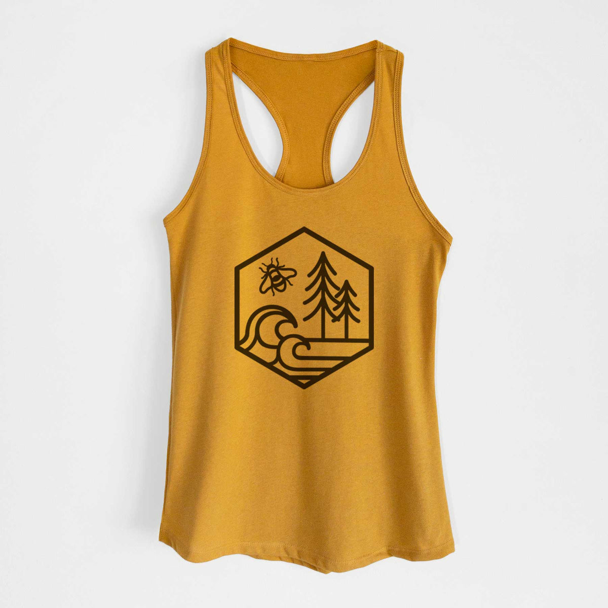 Gold women's racerback tank top laid flat, printed with a black line art hexagon holding a bee, ocean waves and pine trees.
