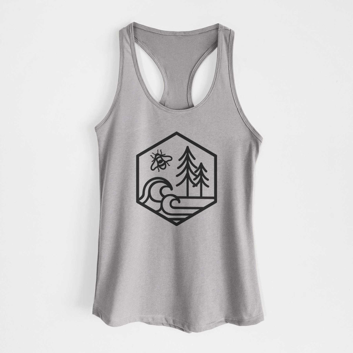 Heather grey women's racerback tank top laid flat, printed with a black line art hexagon holding a bee, ocean waves and pine trees.