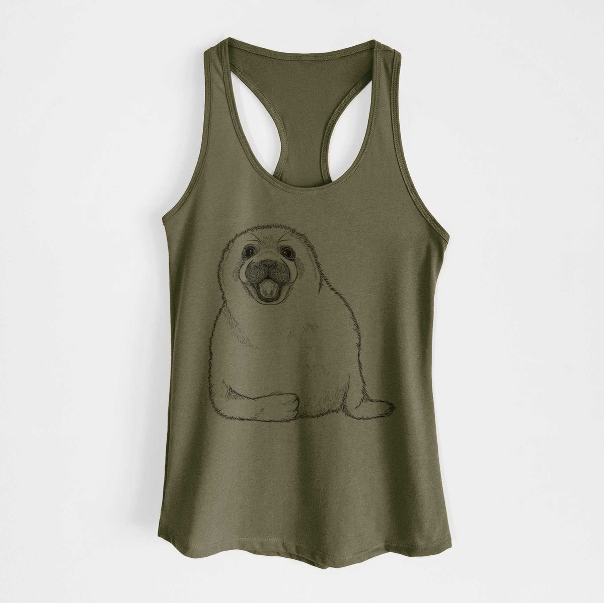 Military green women's racerback tank top laid flat, printed with a black ink illustration of a smiling harp seal pup lying down.