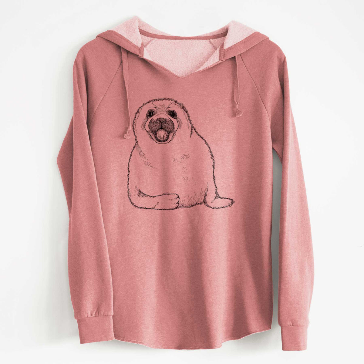 Dusty rose women's Cali Wave hooded sweatshirt laid flat, printed with a black ink illustration of a smiling harp seal pup lying down.