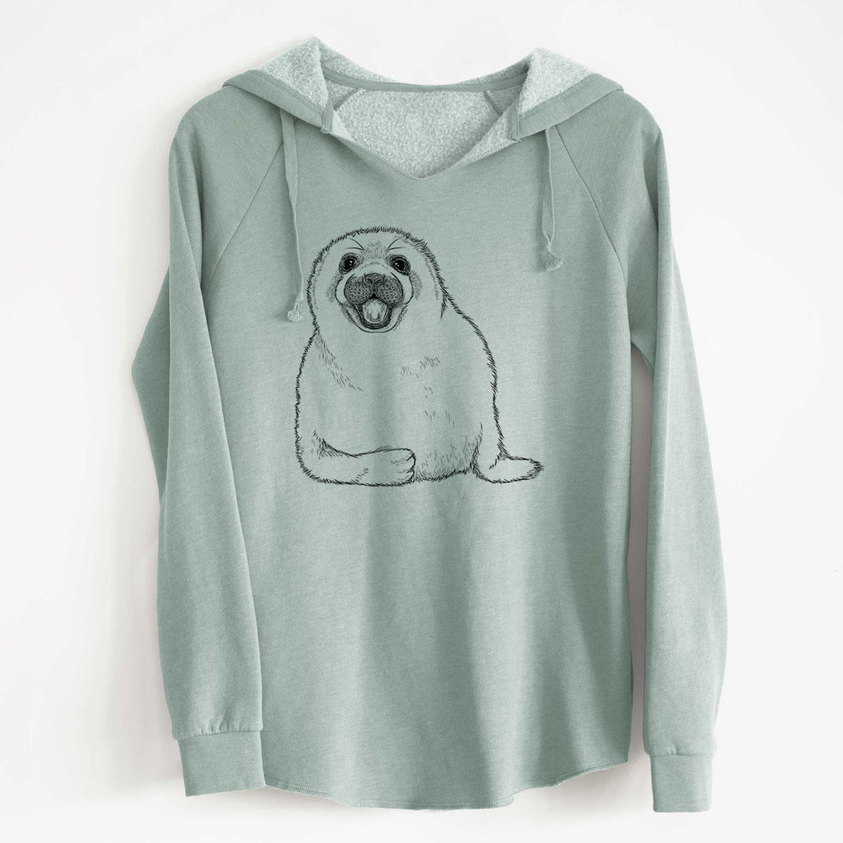 Sage green women's Cali Wave hooded sweatshirt laid flat, printed with a black ink illustration of a smiling harp seal pup lying down.