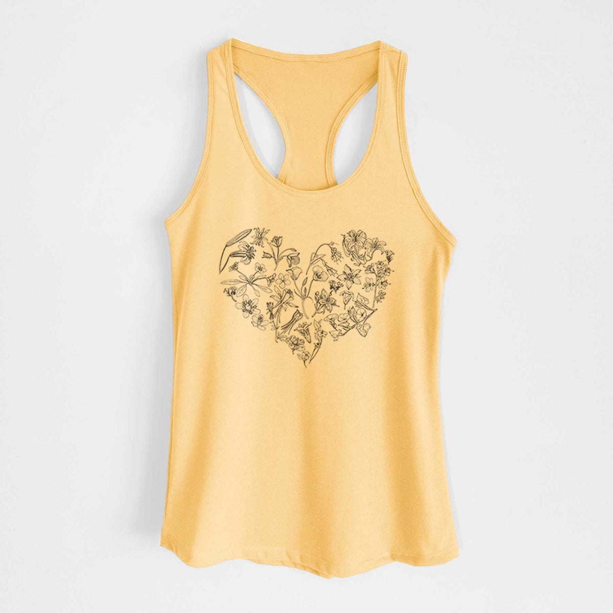 Banana cream women's racerback tank top laid flat, printed with a heart shape filled with black ink California mountain wildflowers.