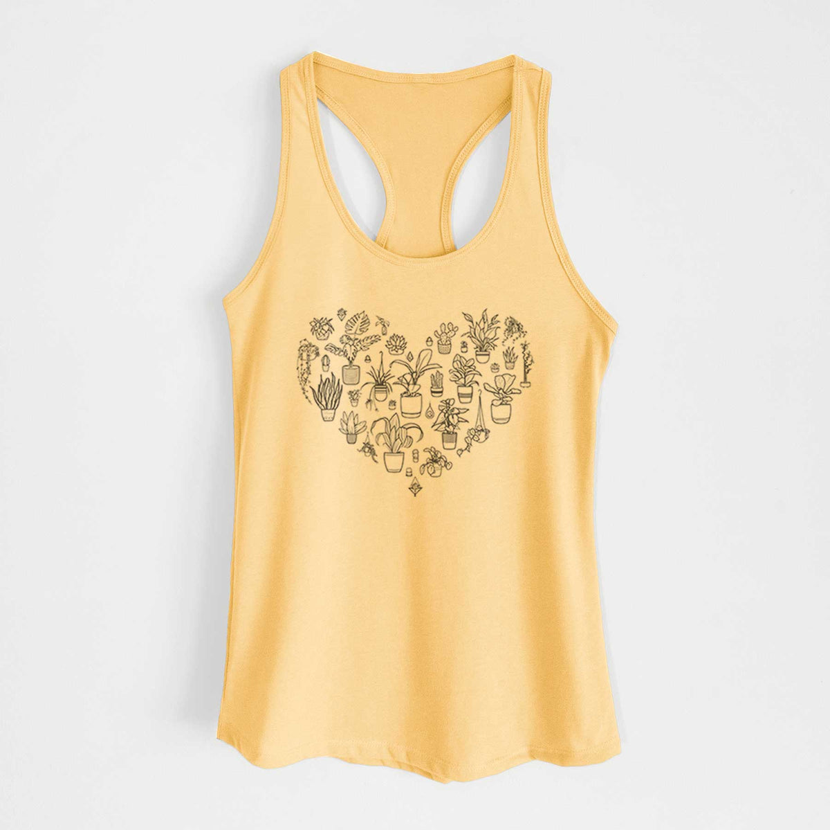 Banana cream women's racerback tank top laid flat, printed with a heart shape filled with black ink potted houseplants.