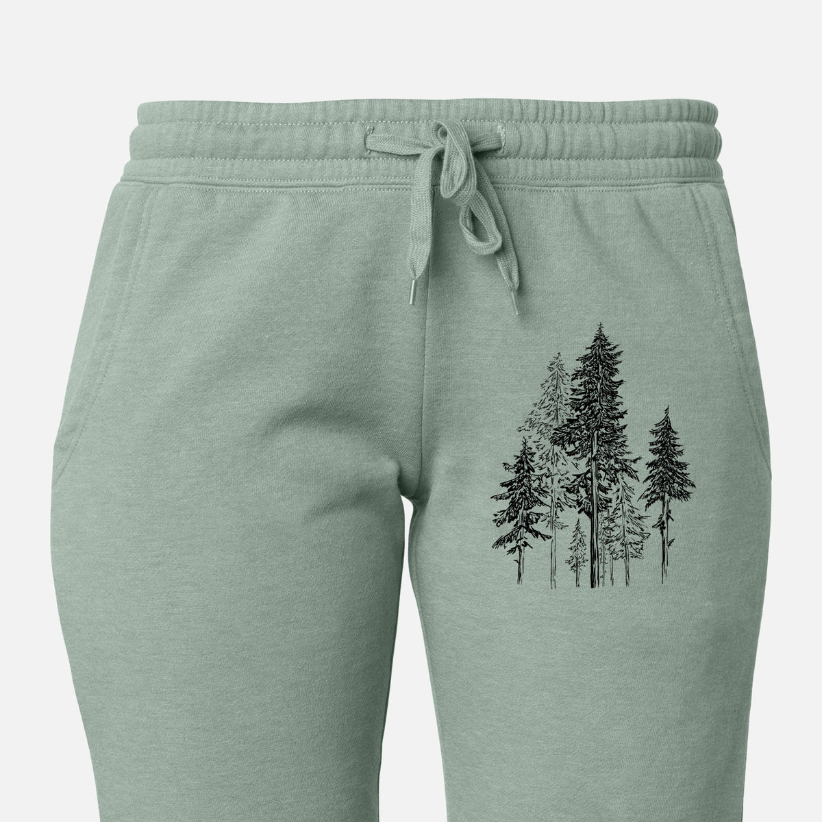 Front of sage green Cali Wave sweatpants, printed with a black ink illustration of a forest of tall hemlock trees on the leg.