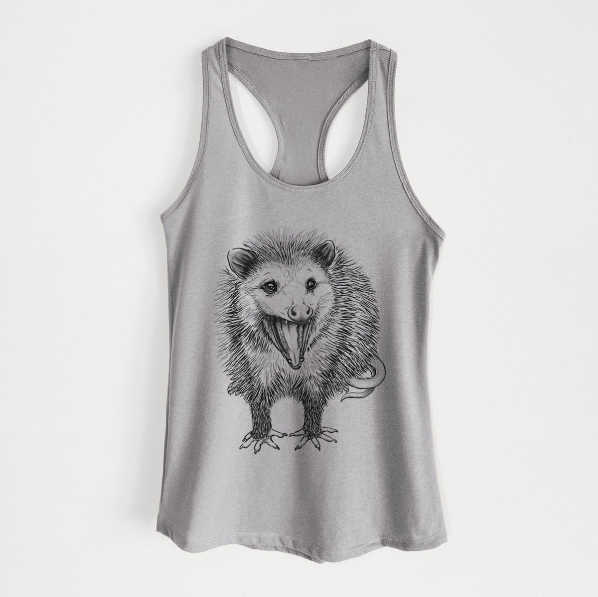 Heather grey women's racerback tank top laid flat, printed with a detailed black ink illustration of an opossum standing and facing forward, mouth open wide in a hiss, with shaggy fur and its tail curled behind.