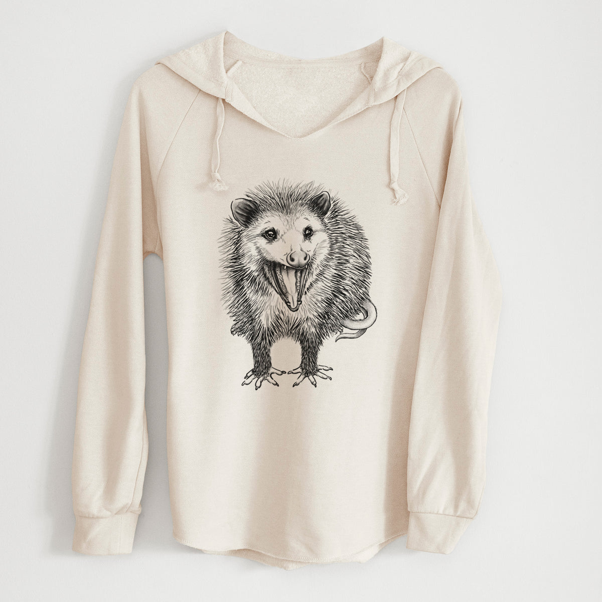 Bone cream women's Cali Wave hooded sweatshirt laid flat, with a crossover hood, drawcords and curved hem, printed with a detailed black ink illustration of an opossum standing and facing forward, mouth open wide in a hiss, with shaggy fur and its tail curled behind.