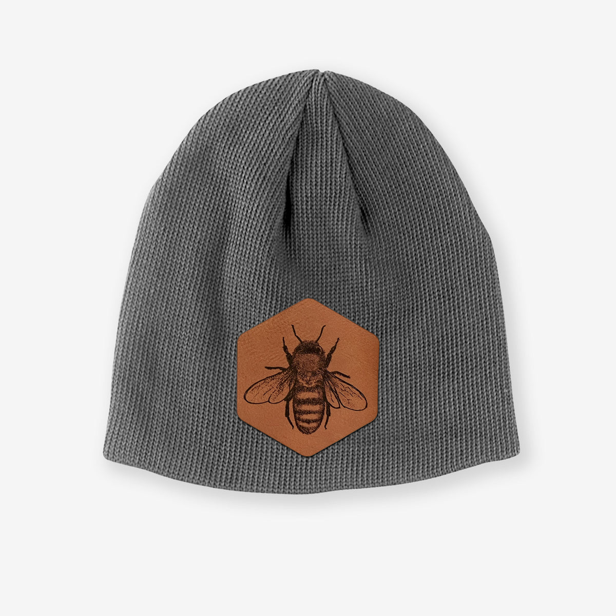 Grey cotton beanie with a brown leather patch engraved with a honey bee on the front.