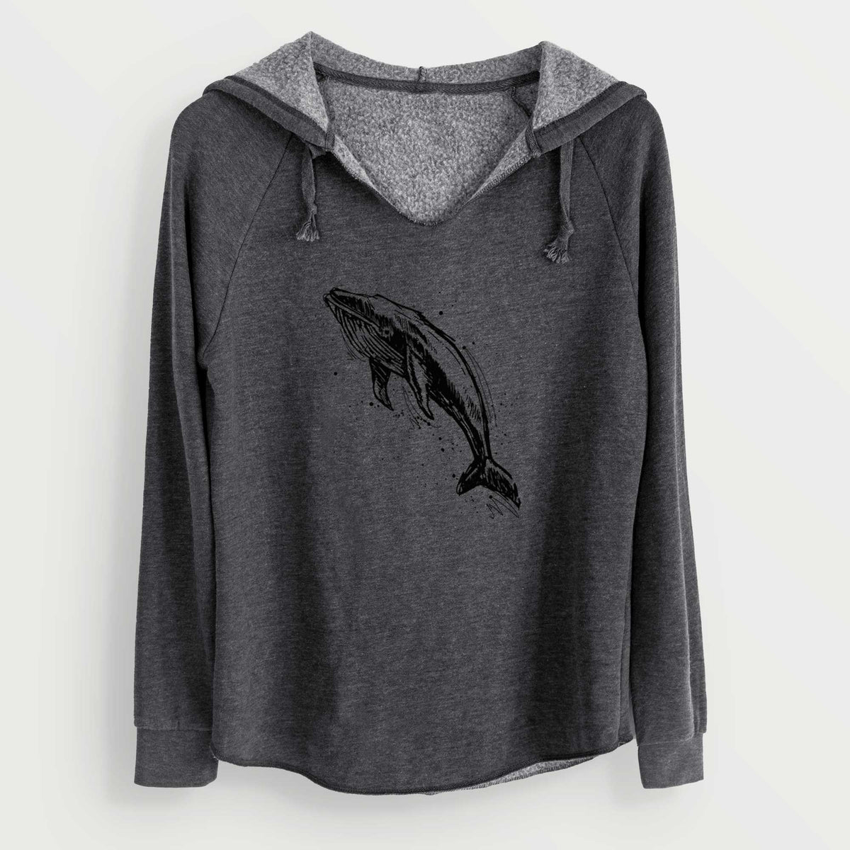 Charcoal grey women's Cali Wave hooded sweatshirt laid flat, printed with a black ink illustration of a humpback whale diving, with ink splatters.