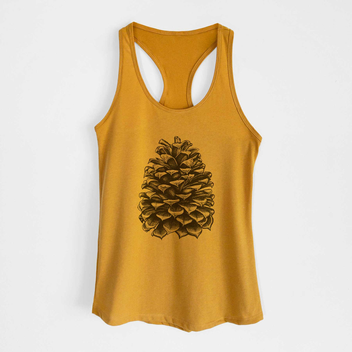 Gold women's racerback tank top laid flat, printed with a detailed black ink illustration of a large Jeffrey pine cone.