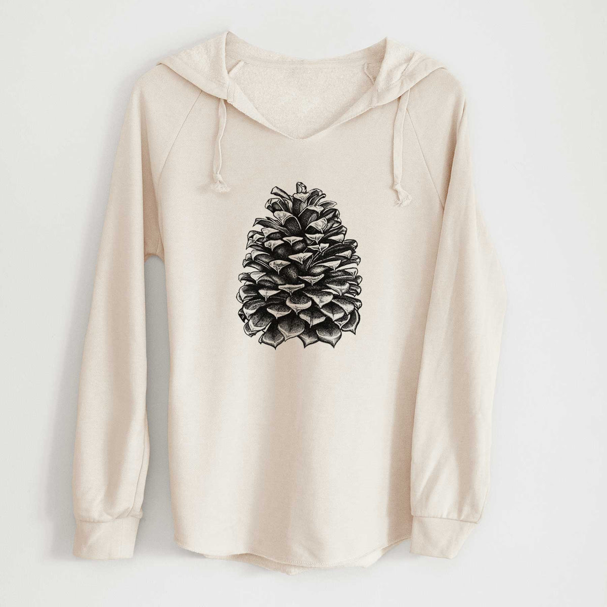 Bone cream women's Cali Wave hooded sweatshirt laid flat, printed with a detailed black ink illustration of a large Jeffrey pine cone.
