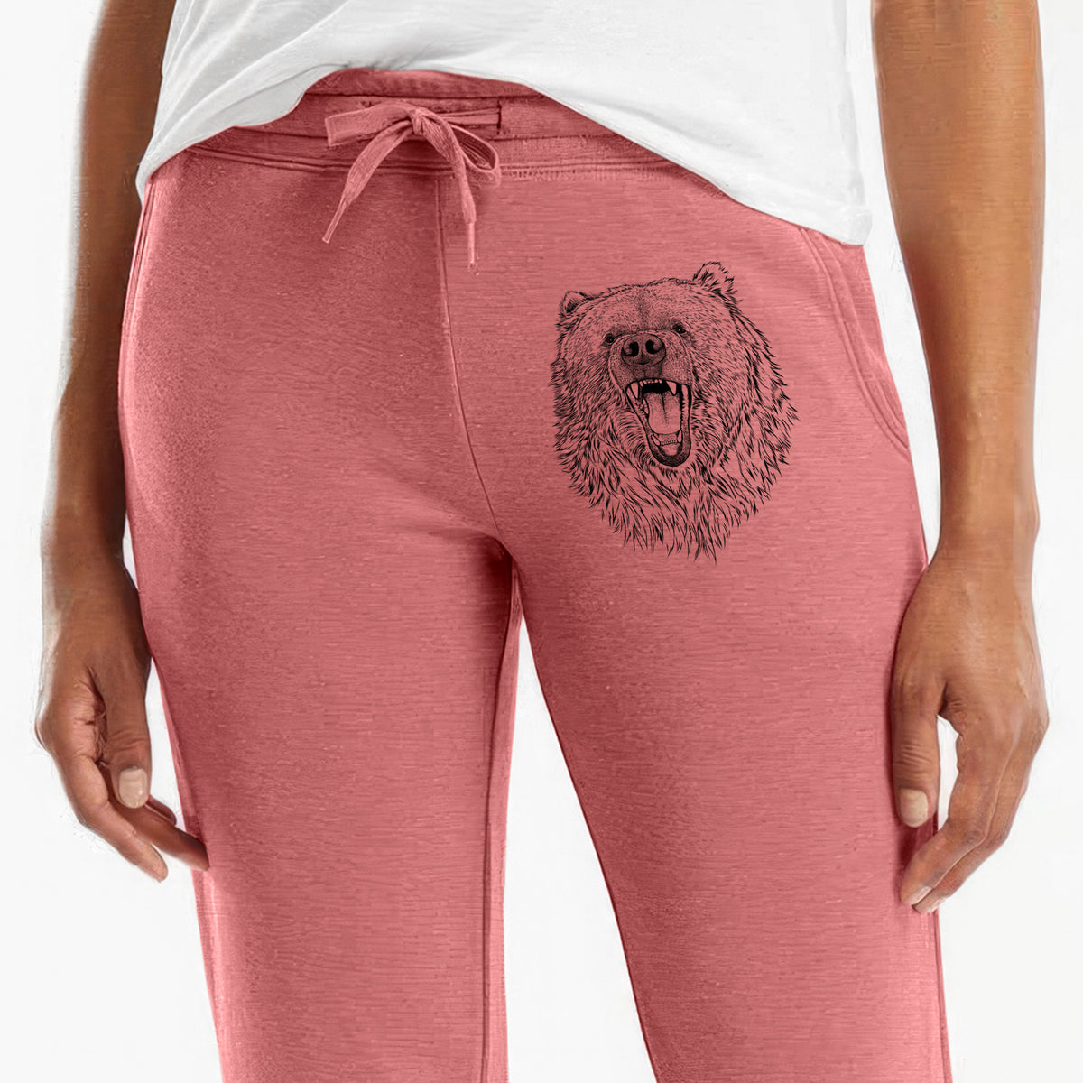 Front of dusty rose Cali Wave sweatpants, printed with a detailed black ink portrait of a roaring Kodiak bear facing forward on the leg.