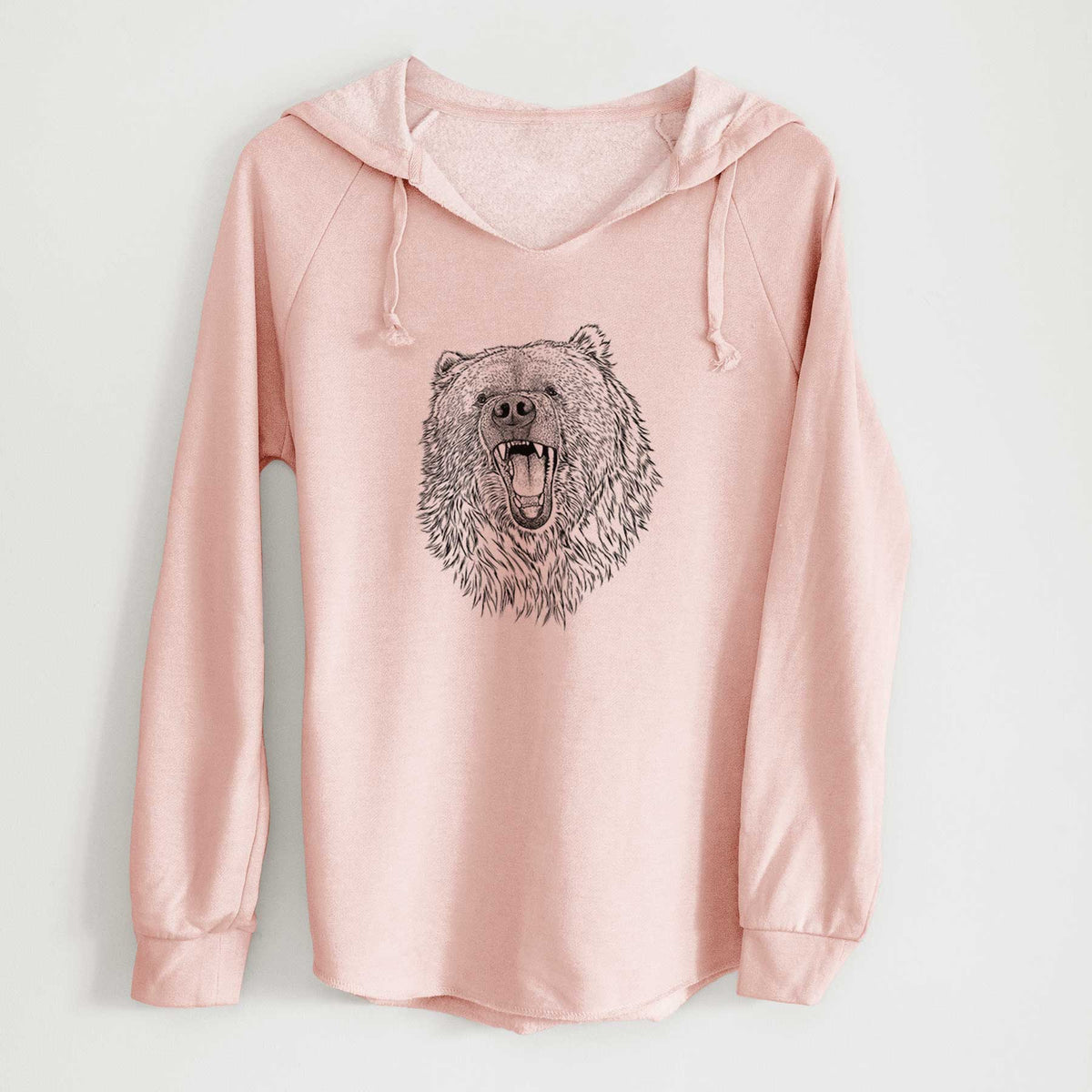 Blush pink women's Cali Wave hooded sweatshirt laid flat, printed with a detailed black ink portrait of a roaring Kodiak bear facing forward.