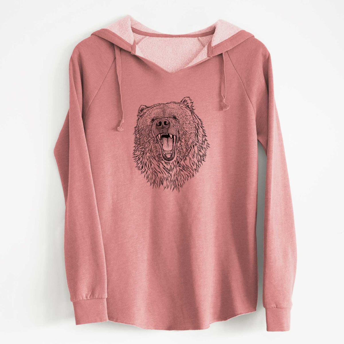 Dusty rose women's Cali Wave hooded sweatshirt laid flat, printed with a detailed black ink portrait of a roaring Kodiak bear facing forward.