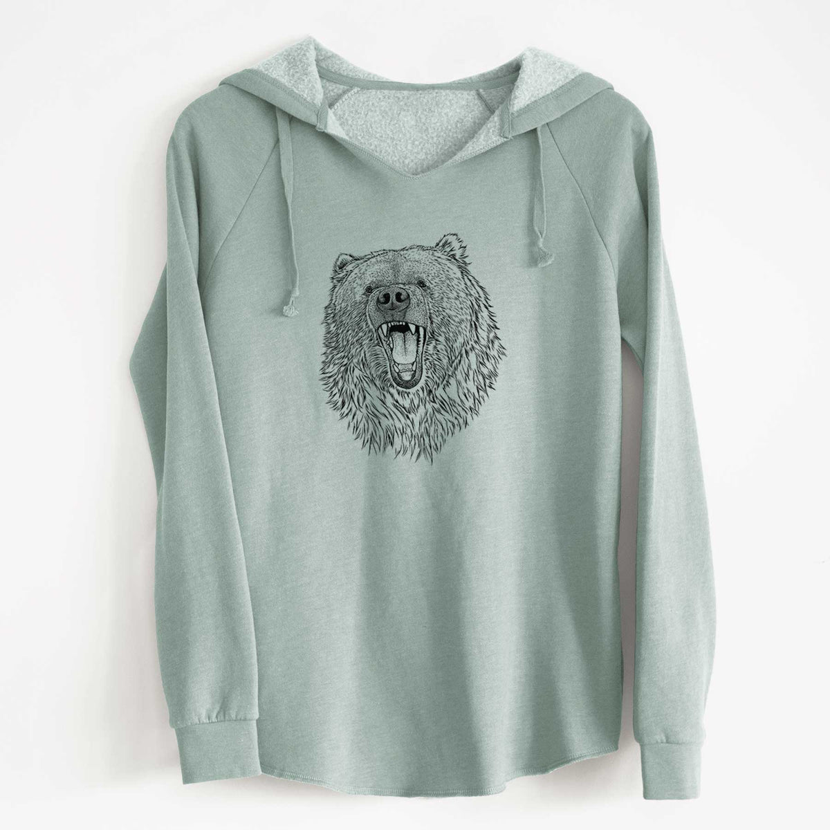 Sage green women's Cali Wave hooded sweatshirt laid flat, printed with a detailed black ink portrait of a roaring Kodiak bear facing forward.