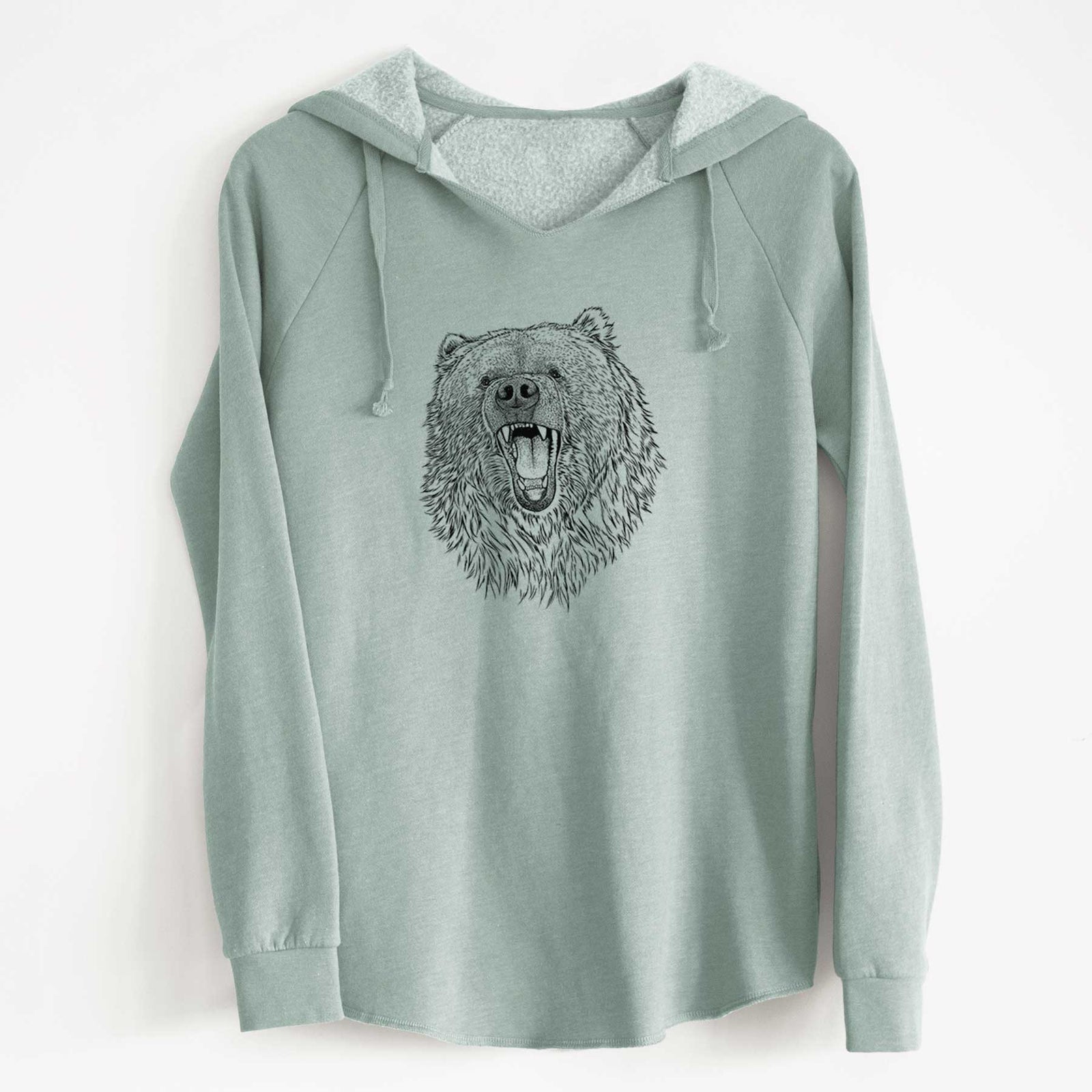Misty blue women's Cali Wave hooded sweatshirt laid flat, printed with a detailed black ink portrait of a roaring Kodiak bear facing forward.