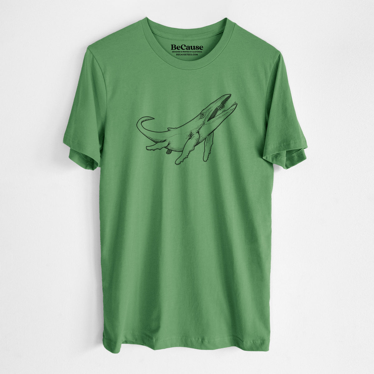 Leaf green lightweight cotton t-shirt laid flat, printed with a black ink illustration of a Kronosaurus marine reptile swimming.