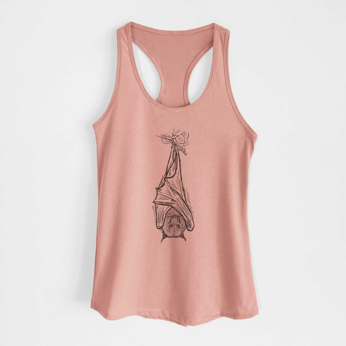 Desert pink women's racerback tank top laid flat, printed with a black ink illustration of a large flying fox bat hanging upside down with its wings wrapped around it.