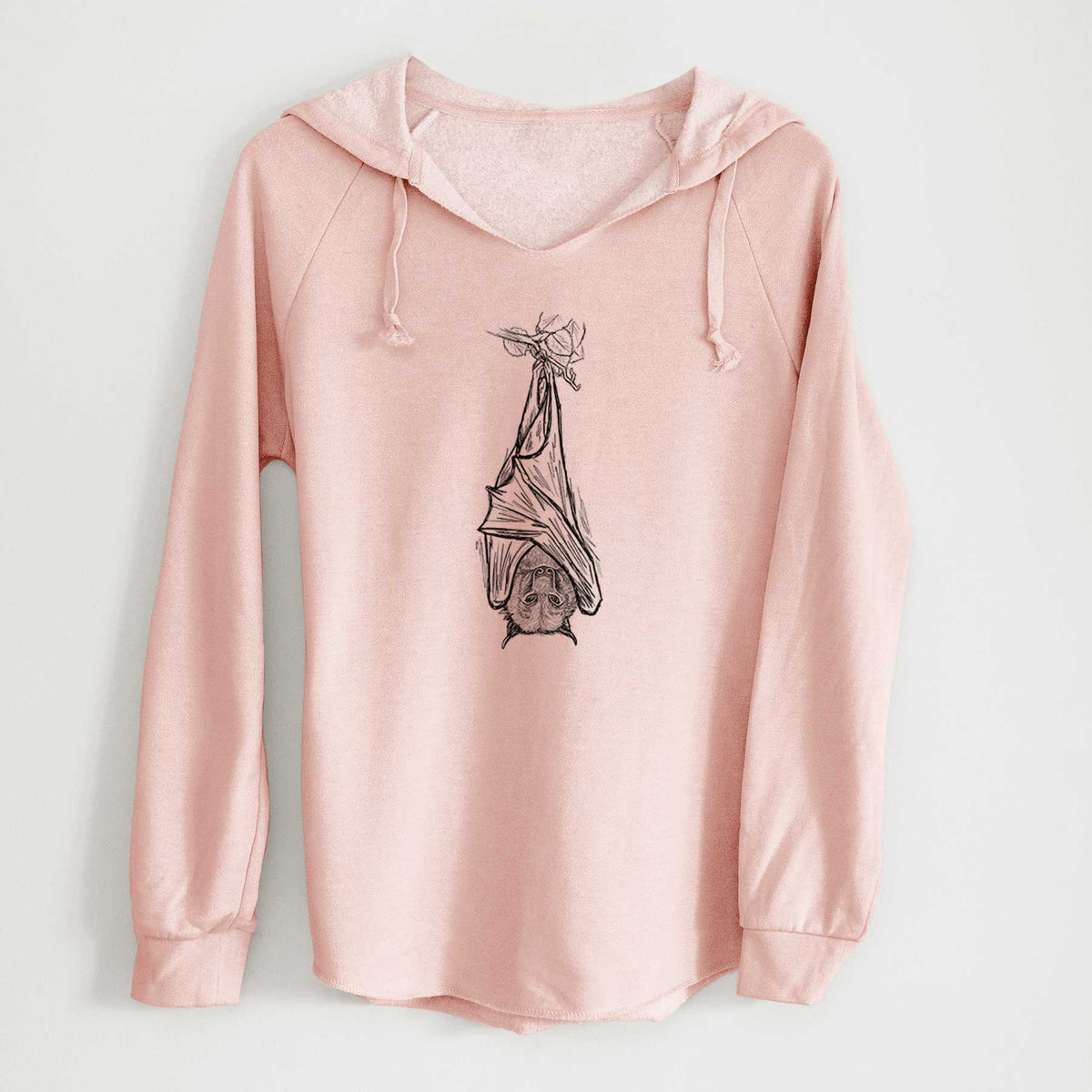 Blush pink women's Cali Wave hooded sweatshirt laid flat, printed with a black ink illustration of a large flying fox bat hanging upside down with its wings wrapped around it.