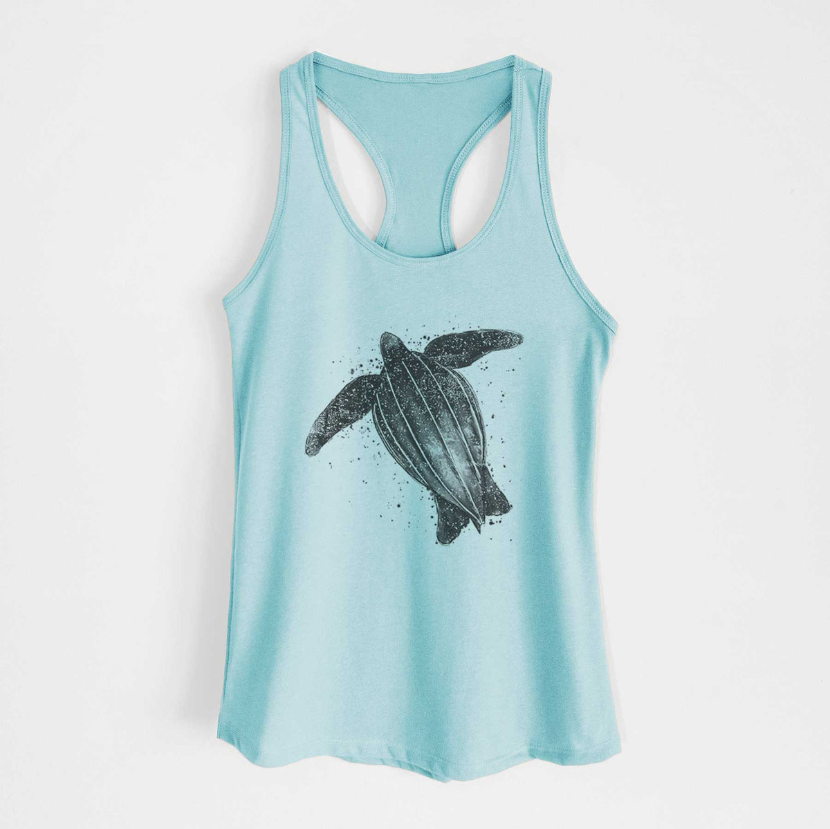 Cancun blue women's racerback tank top laid flat, printed with a black ink illustration of a leatherback sea turtle swimming, with ink splatters.