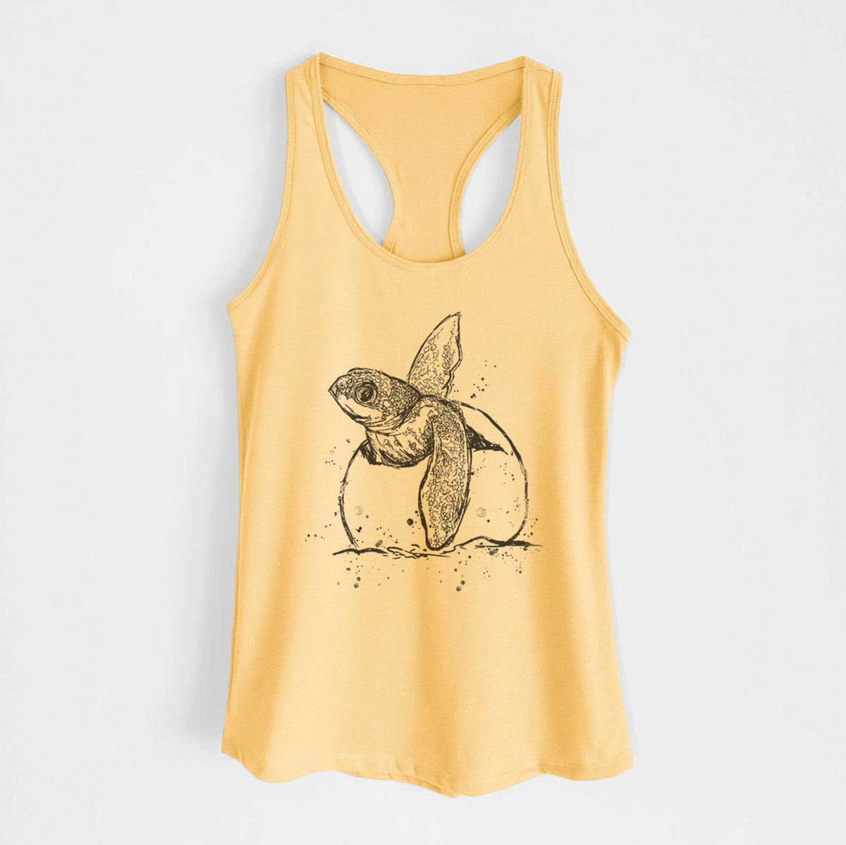 Banana cream women's racerback tank top laid flat, printed with a black ink illustration of a leatherback sea turtle hatchling emerging from its egg.