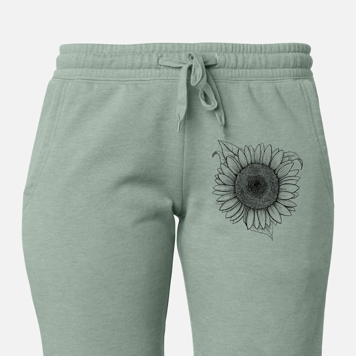 Front of sage green Cali Wave sweatpants, printed with a detailed black ink line drawing of a Lemon Queen sunflower in bloom on the leg.