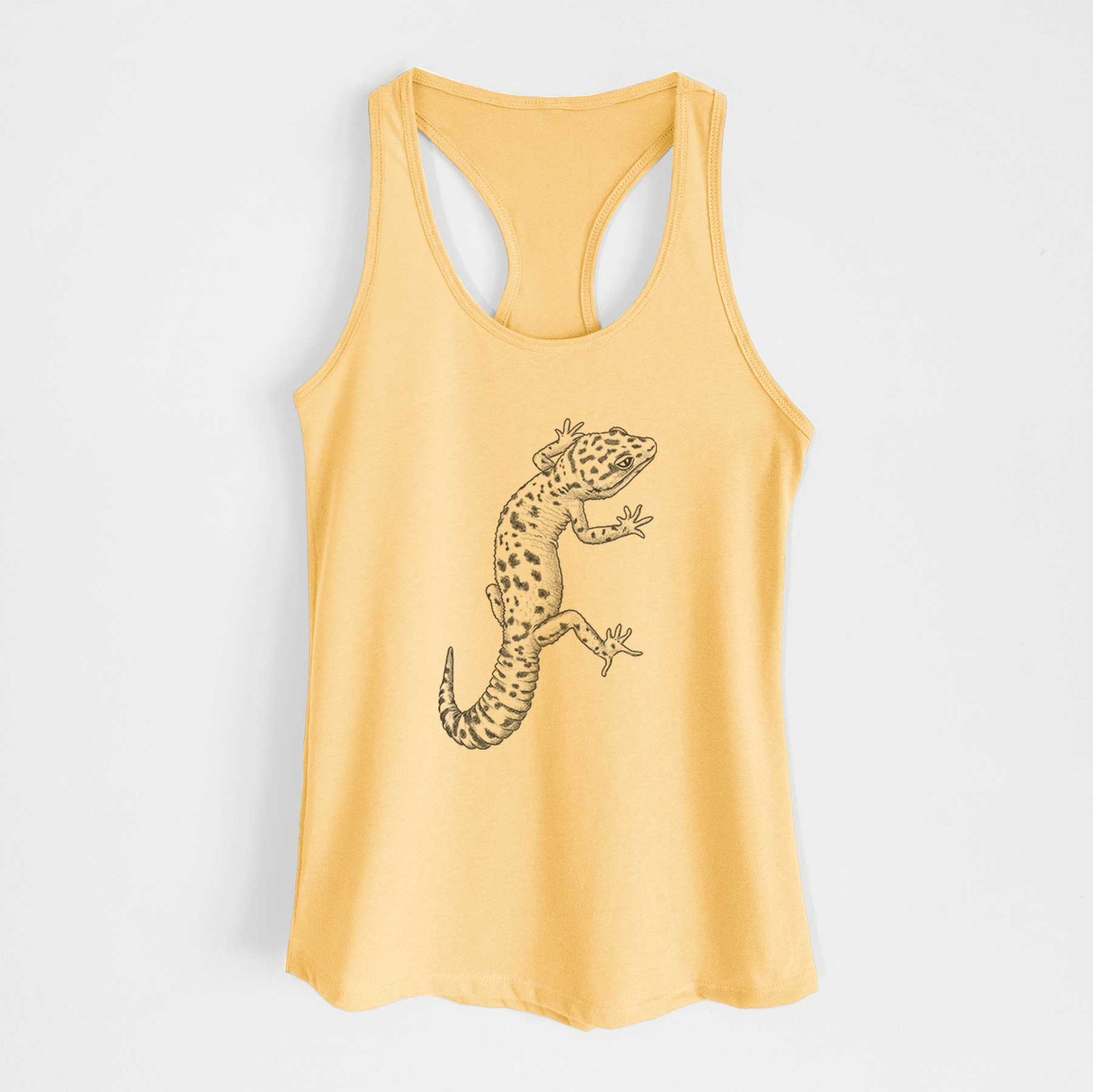 Banana cream women's racerback tank top laid flat, printed with a detailed black ink illustration of a spotted leopard gecko climbing.