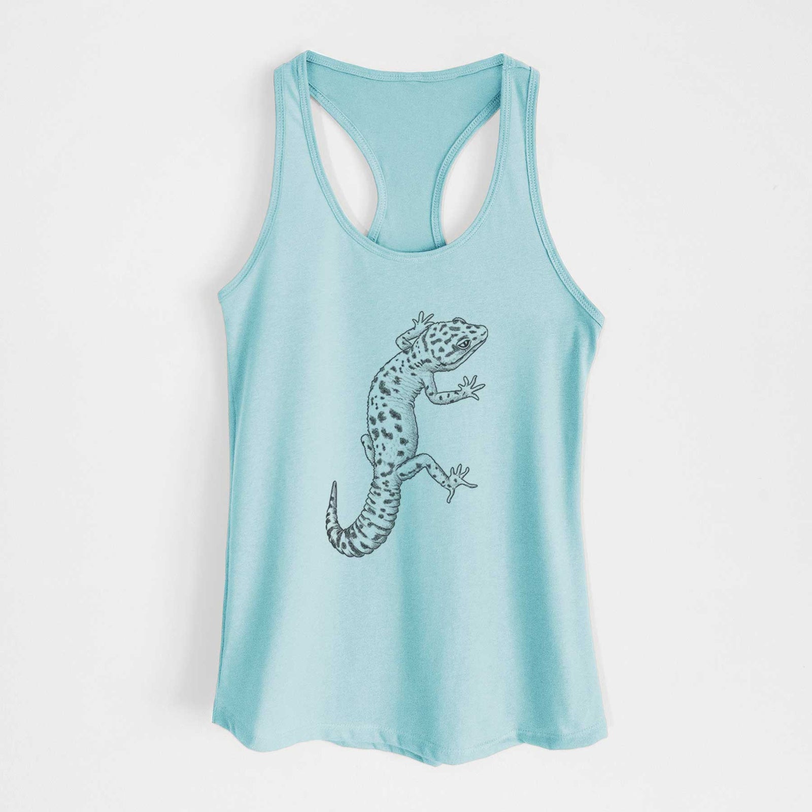 Banana cream women's racerback tank top laid flat, printed with a detailed black ink illustration of a spotted leopard gecko climbing.