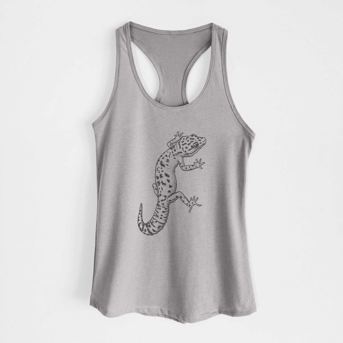 Heather grey women's racerback tank top laid flat, printed with a detailed black ink illustration of a spotted leopard gecko climbing.
