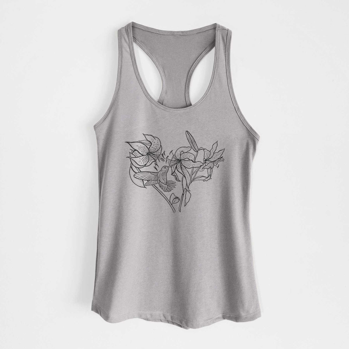 Heather grey women's racerback tank top laid flat, printed with a black ink line drawing of lilies and a hummingbird arranged in a heart shape.