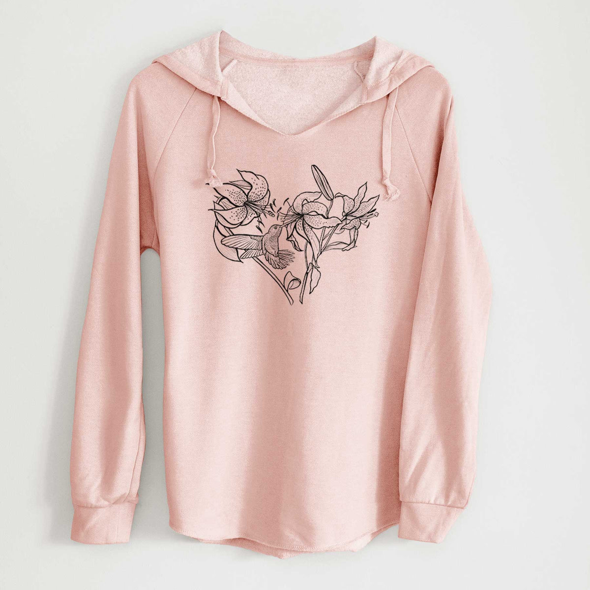 Blush pink women's Cali Wave hooded sweatshirt laid flat, printed with a black ink line drawing of lilies and a hummingbird arranged in a heart shape.